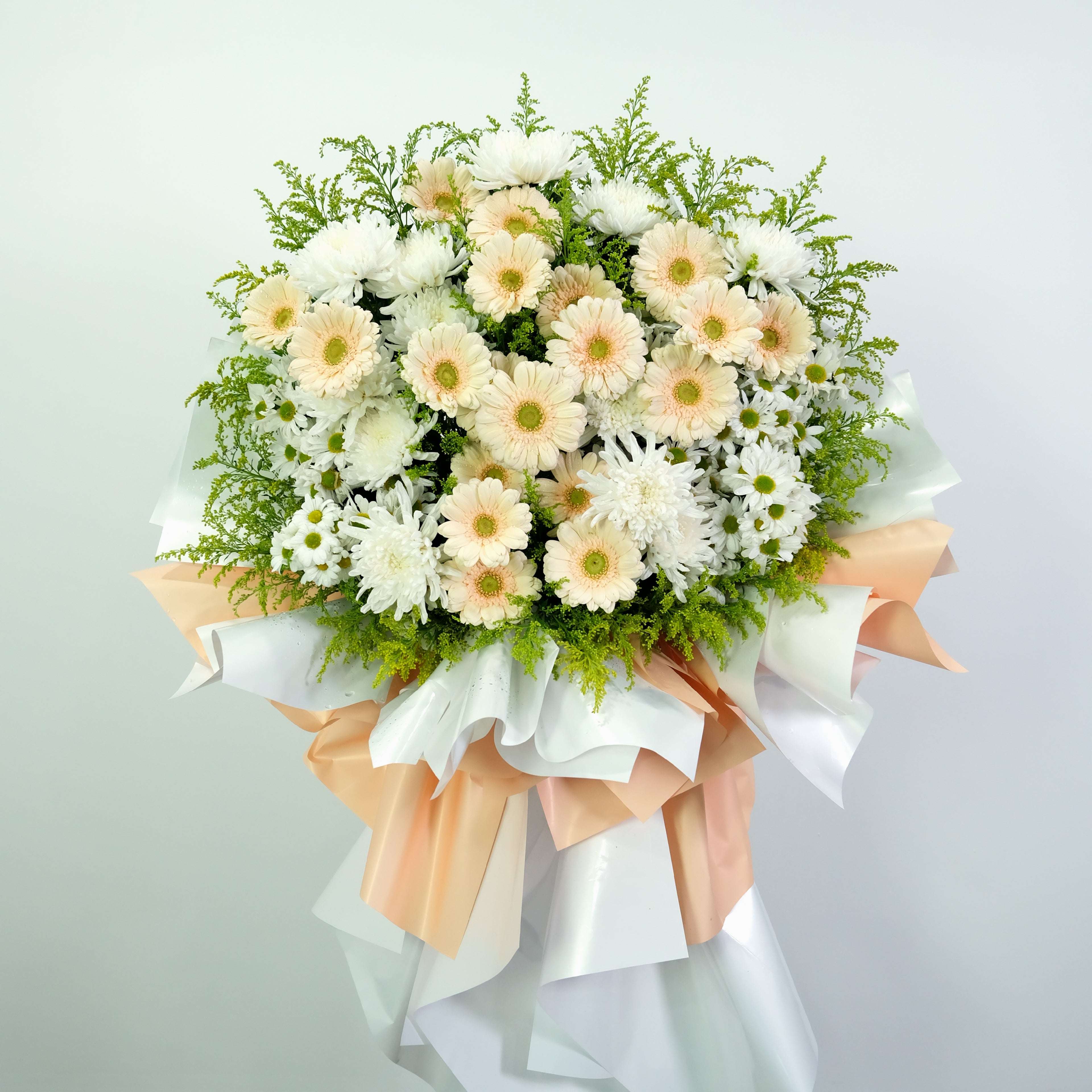 Bouquet of flowers with white and beige flowers on a light gray background
