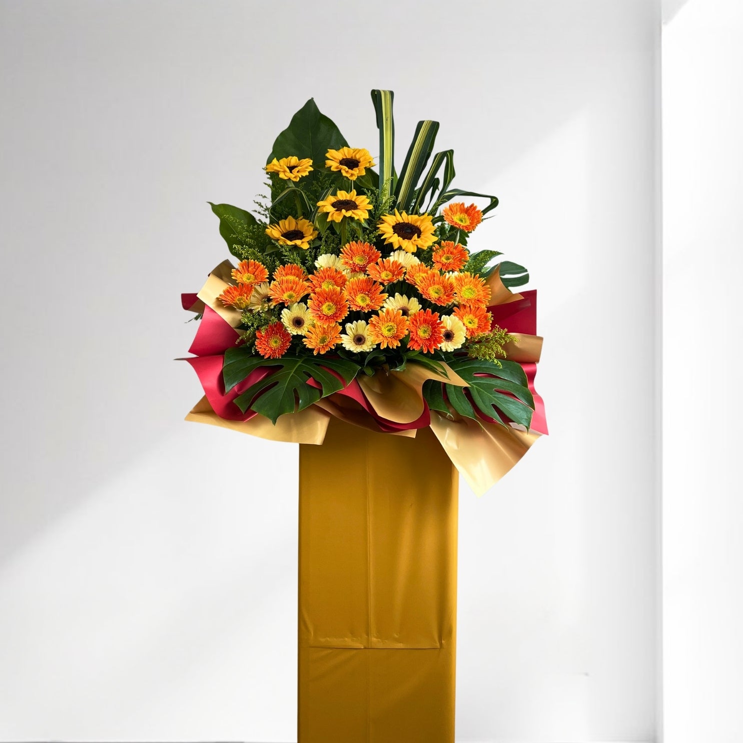 Bouquet of flowers with greenery and ribbons on a white background