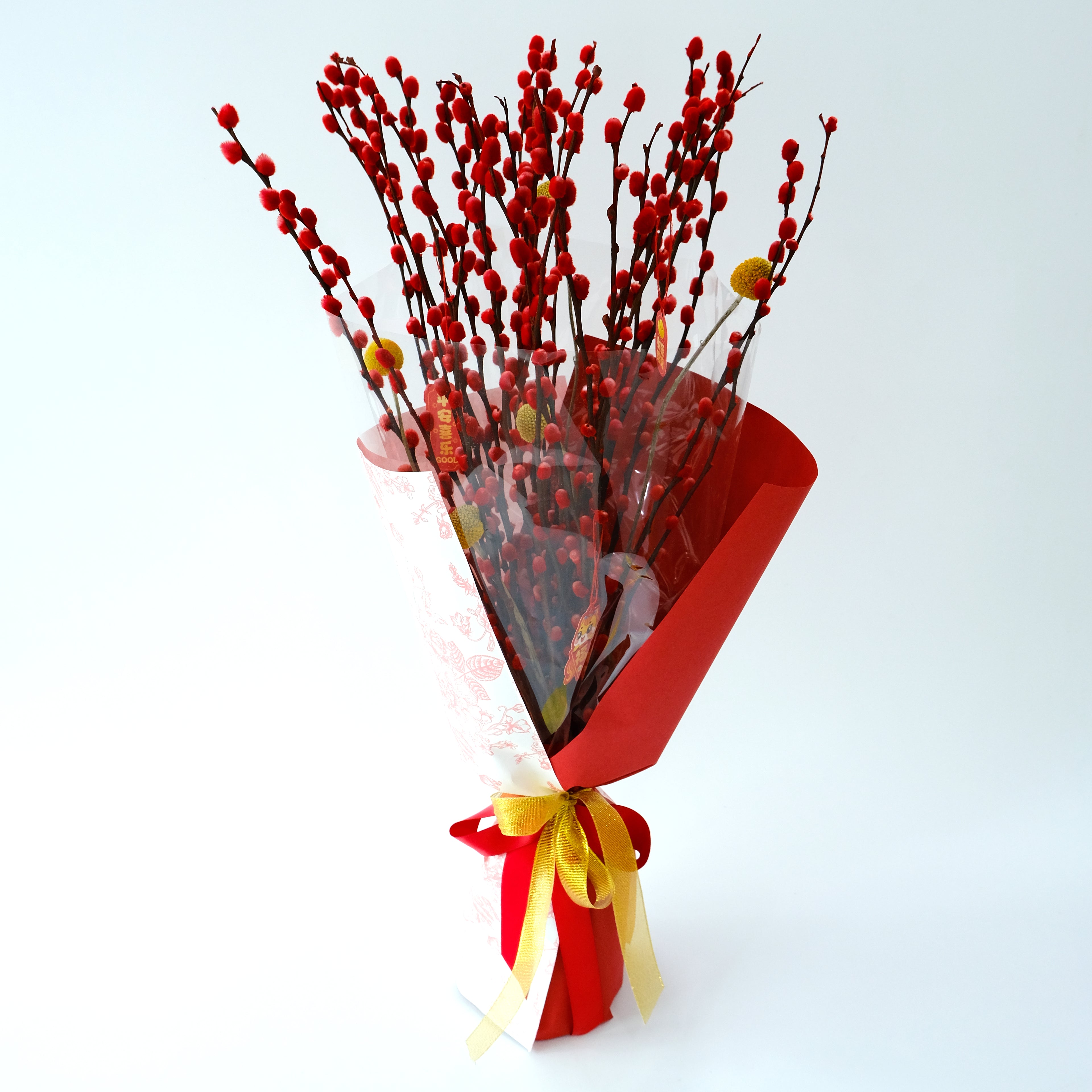 CNY Hong Yun Bouquet with pink pussy willow branches and traditional ornaments in a designer pink wrap for luxury delivery in KL.